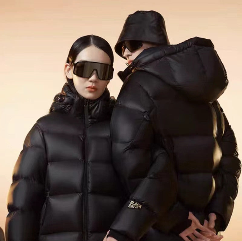 Unisex quiltad vinterjacka – kort modell, varm & stilren (svart/guld)