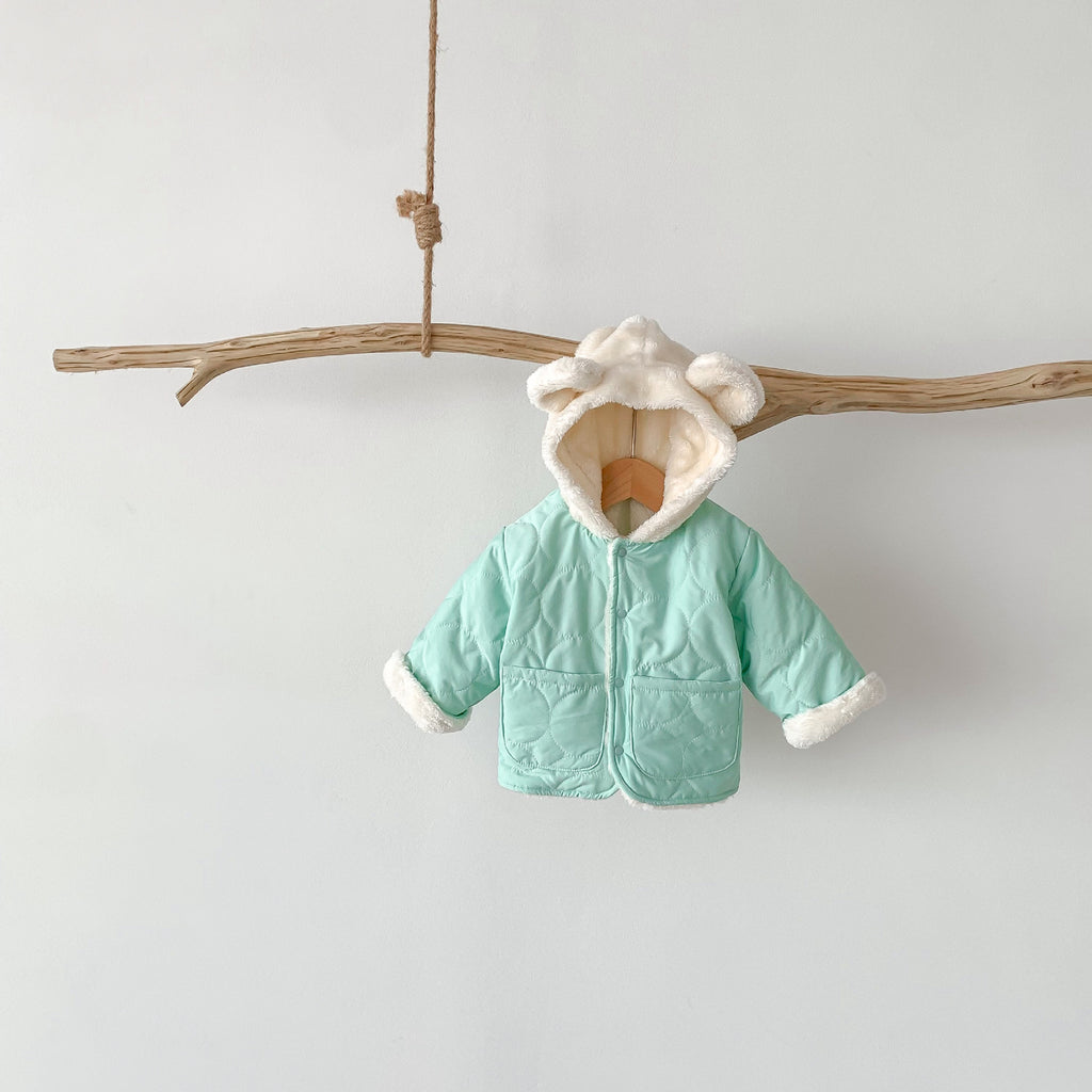 Mysig fleecefodrad jacka med quiltad design