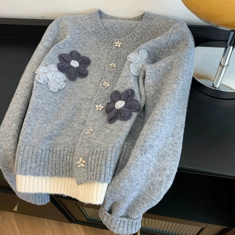 Trendig lös stickad tröja med blombroderi för kvinnor